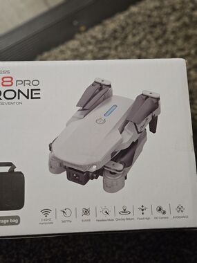 Foldable White/Grey Drone with HD Camera